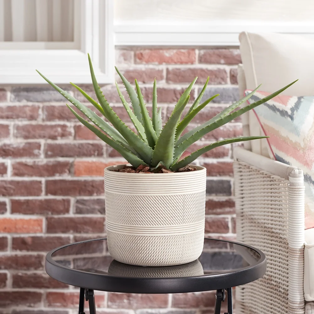 Modern indoor plant pot with drainage holes