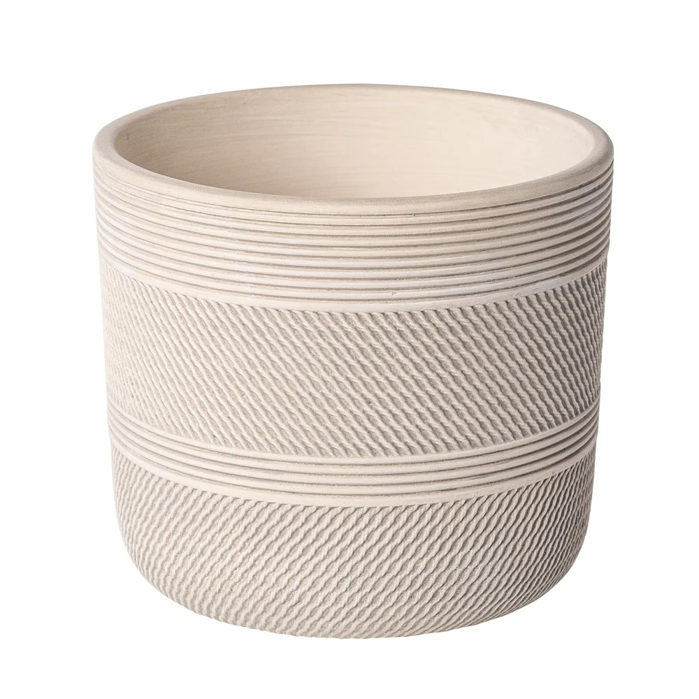 White ceramic planter with grooved design