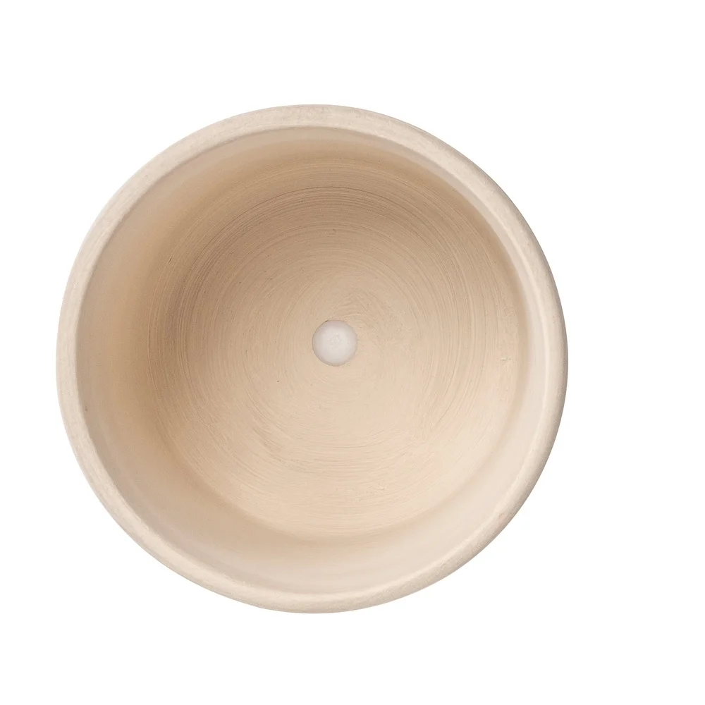 White ceramic planter with grooved design