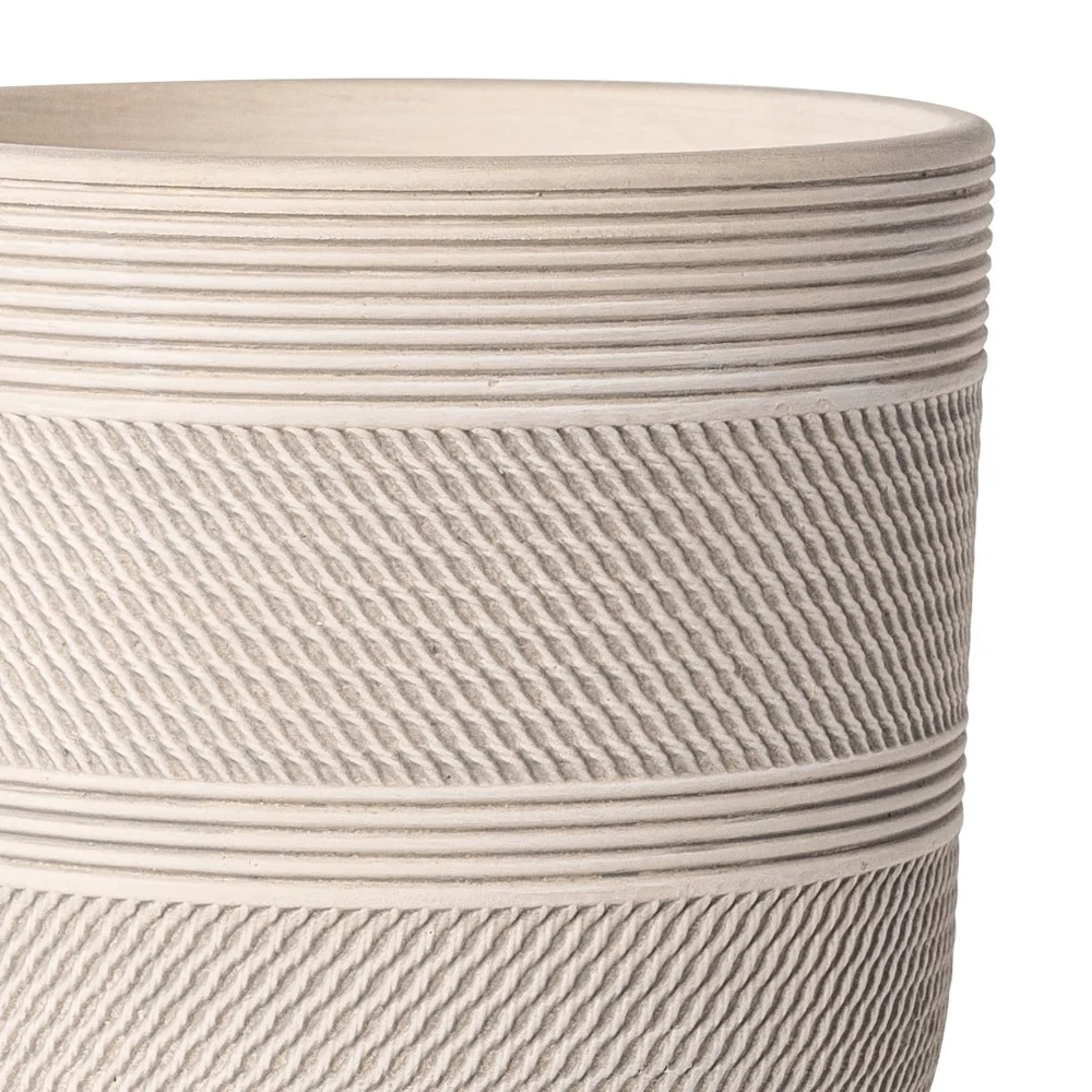 White ceramic planter with grooved design